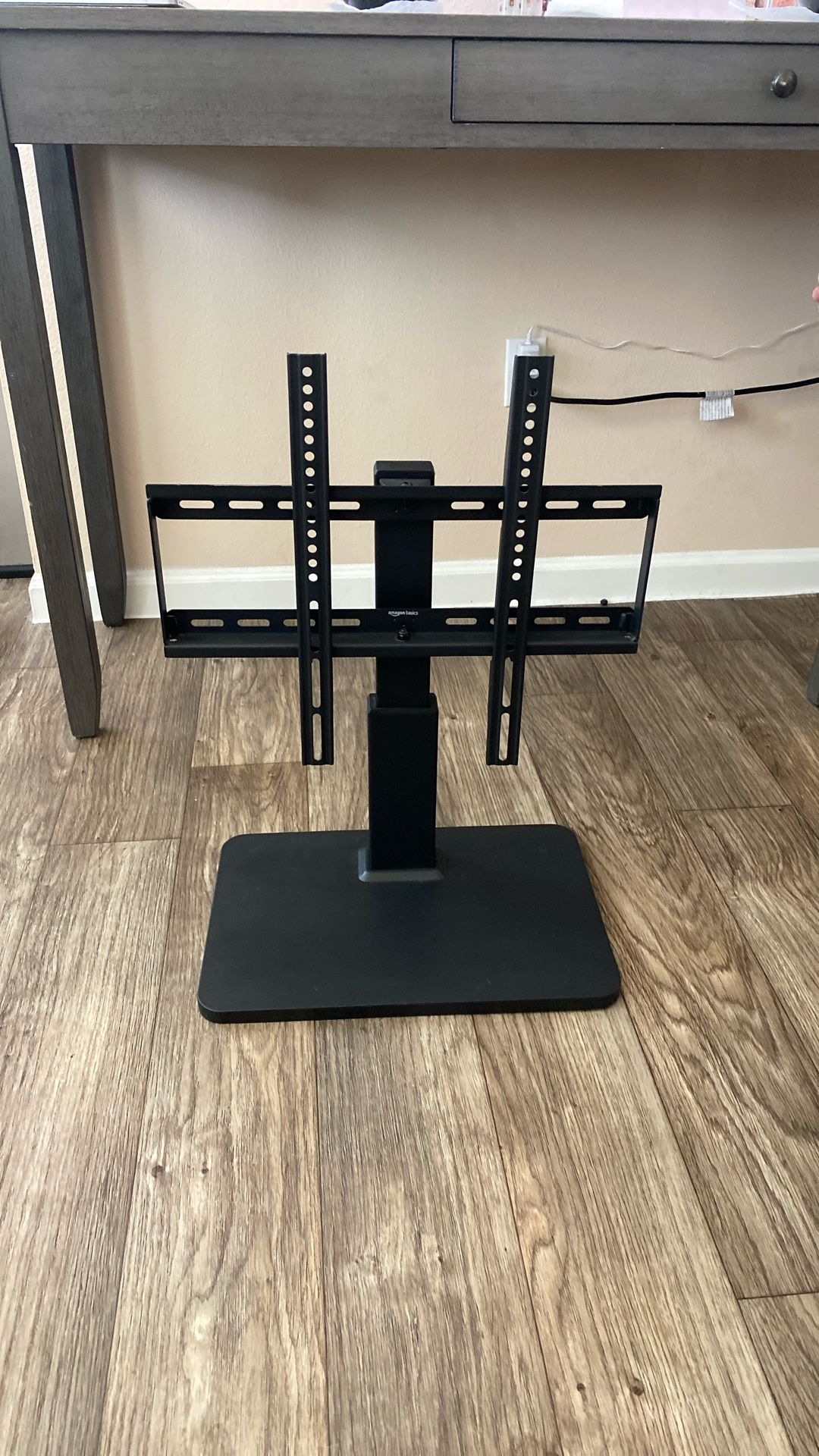 Amazon Basics Swivel Pedestal Table Top TV Mount for 32" to 65" TVs up to 55 lbs, Height Adjustable 14-19 Inches, Max VESA 400x400, Black