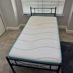 Twin bed with mattress