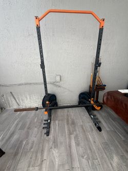 Squat Rack , Barbell and bumper plates