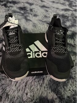 Adidas black turf shoes