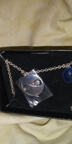 Infinity necklace with blue stone