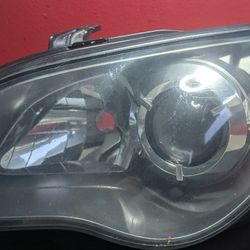 2005-2007 Subaru-Outback/Legacy Headlight-Assemblies-Pair-Black Refurbished OEM Units