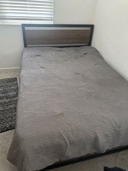 Two Full Size Metal Bed Frames with Wood Accents