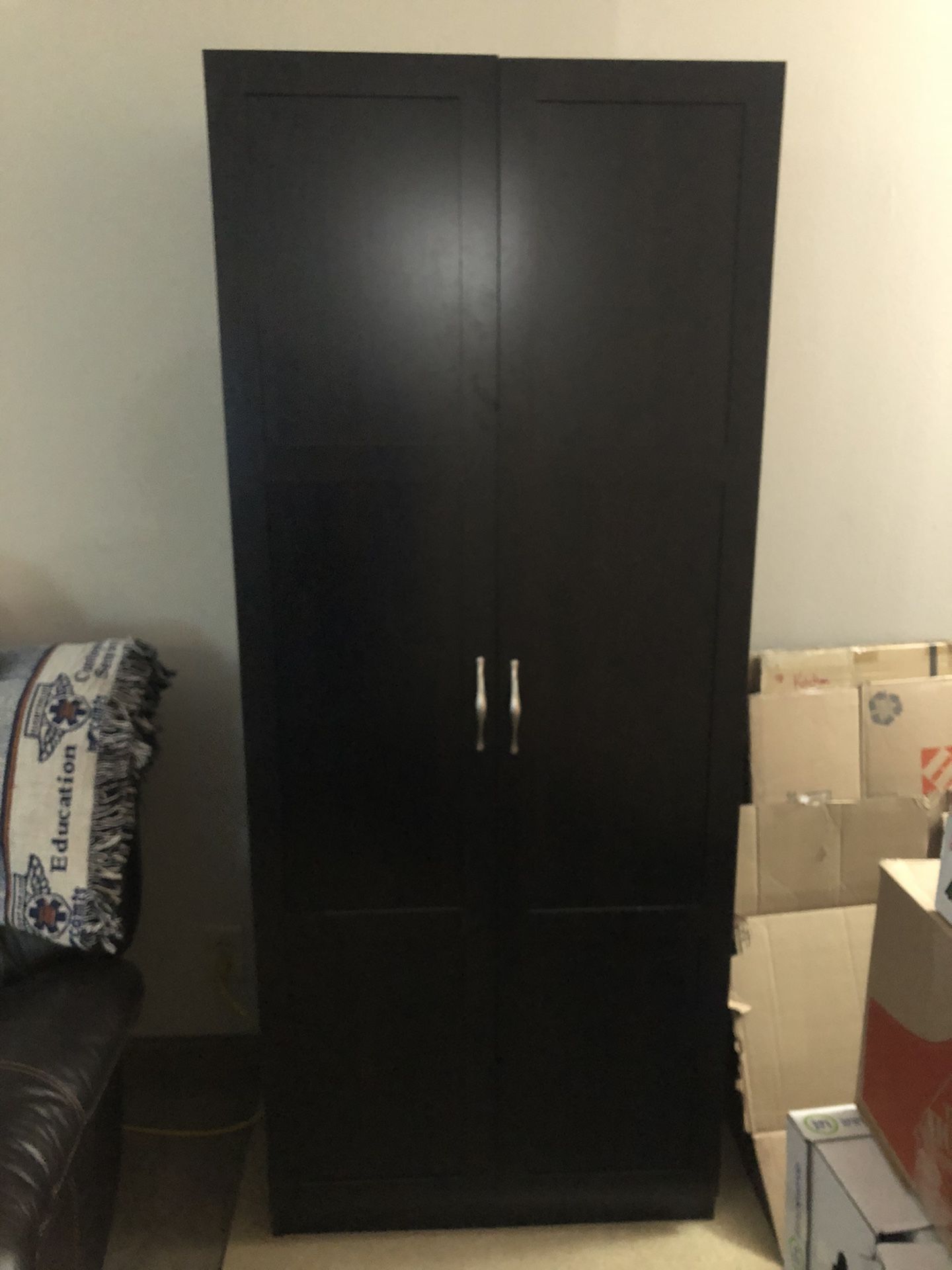 Dark brown storage cabinet