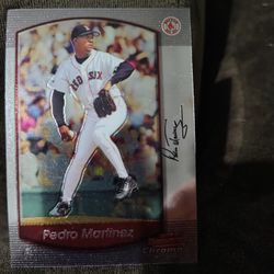 Pedro Martinez Baseball Card And Garrett Wilson Football Card