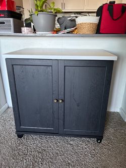 Black Wood Cabinet with White Top