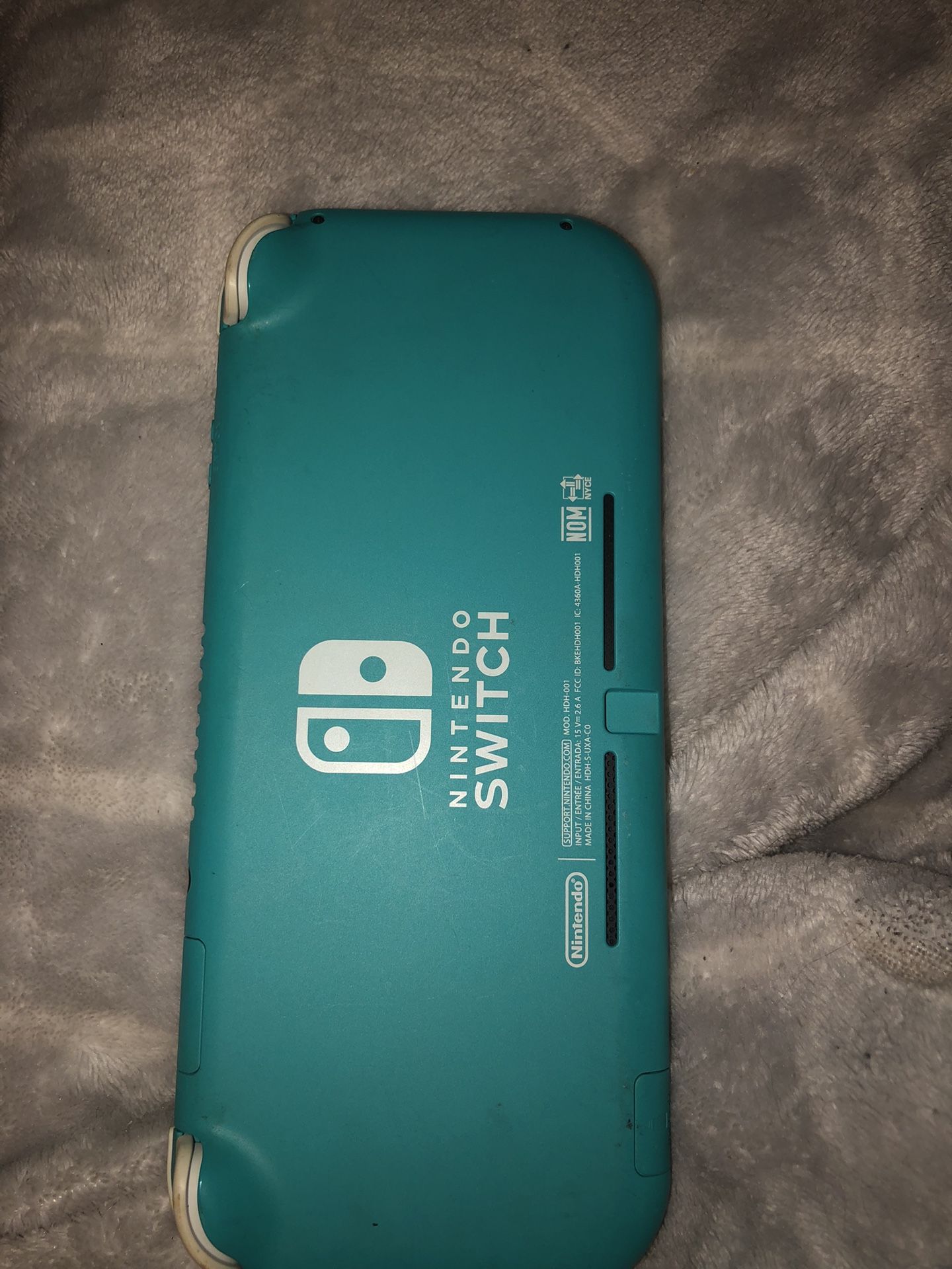 Nintendo  Switch Lite Turquoise Excellent Condition With 4 Games