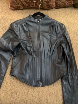 Woman’s Size large Bebe Pleather Jacket