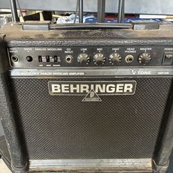 Small behringer guitar amp with microphone