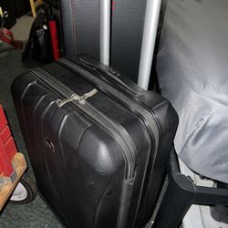 Delsey Suite Case. All Intact. Zippers Fully Work. No Key For Lock Though