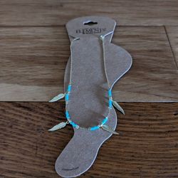 Boho Chic Turquoise Beads, Native Indian Feather Anklet. Handcrafted By Elements

Adjustable anklet / bracelet. Colorful & Stylish. Spread your positi