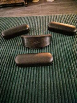 BRAND NEW!!! (3) OAKLEY SUNGLASS HOLDERS & (1) CALVIN KLEIN COLLECTION HOLDER! ***$7 EACH, OR ALL FOR $20!***