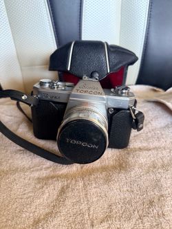 Beseler Topcon Unirex 35mm SLR Film Camera