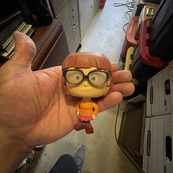 2021 McDonald's Scooby-Doo Happy Meal toy featuring the character Velma Dinkley as a bobblehead.