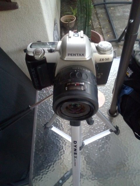 Pentax Camera And Tripod