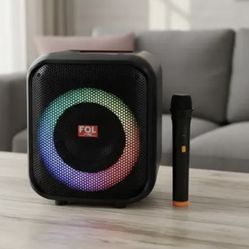 Fol L1216M TWS SPEAKER WITH WIRELESS MICROPHONE AND LED Lights  