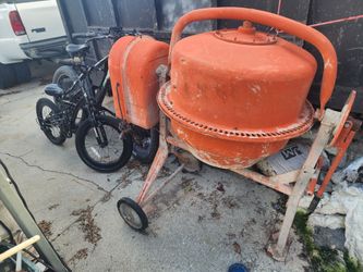 Orange Cement Mixer on Wheels
