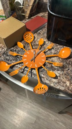 Orange kitchen wall clock