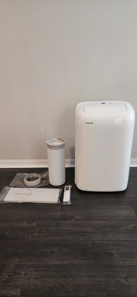 Toshiba 8,000 BTU 115-Volt Portable Air Conditioner with Dehumidifier Mode and all accessories