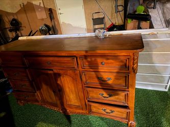 Large Wooden Dresser with Carved Details