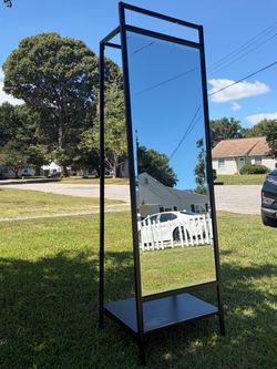 Full-Length Black Metal Floor Mirror with Storage Shelf