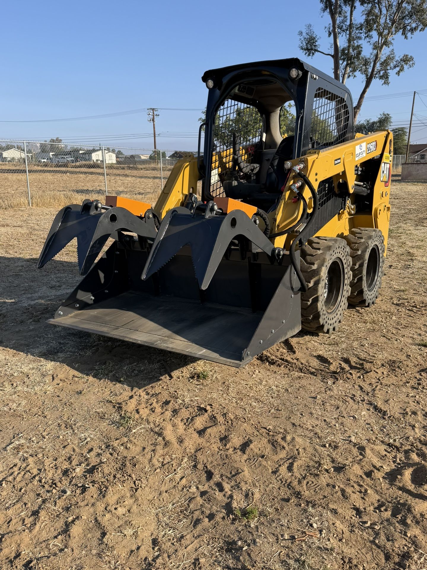 Skid Steer with Grapple