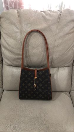 Monogram brown bag . Medium size  very clean