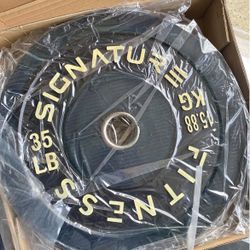 New Pair Of 35 bumper weights