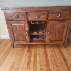 dresser with glass rack