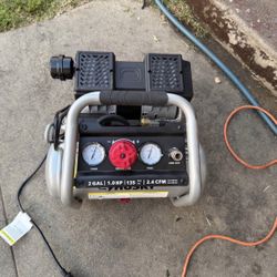 2 Gal. 135 PSI Portable Electric Oil-Free Quiet Jobsite Air Compressor with Dual Pressure Gauges and