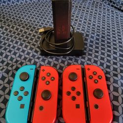 4 Joycons With Joycon charging Tower