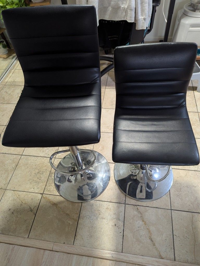 Two Bar Stools With Wear And Tear