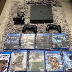 Ps4 Slim with Controllers, Charging Station, and 9 games
