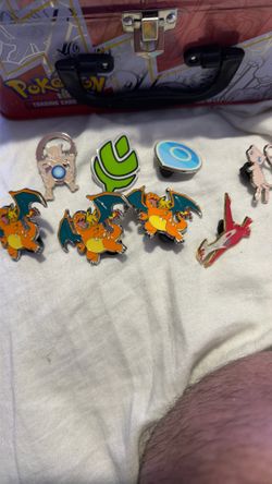Pins, UPC gold coins some still sealed, damage counters, pretty much what you see if you need extra pictures I’m glad to send