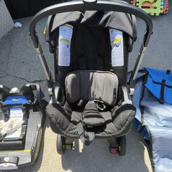 Doona Car Seat + Base + Travel Case
