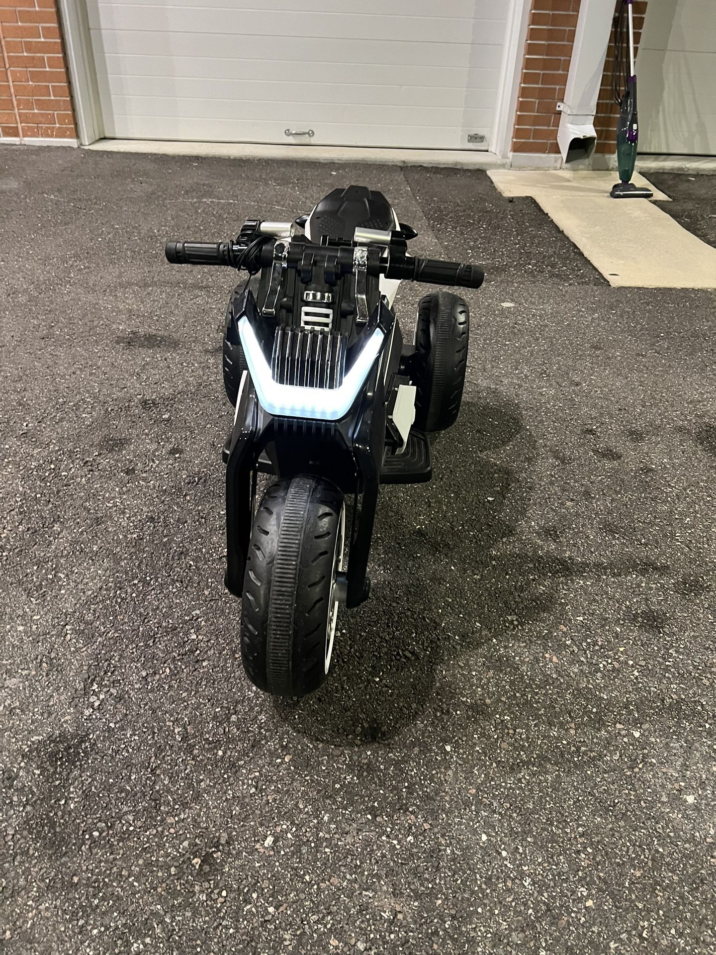 Tobbi 12V Kids Ride Battery Powered Dirt Motorcycle w/ 3 Wheels with charger. Pre owned very gently used in excellent and fully functional. Pick up lo