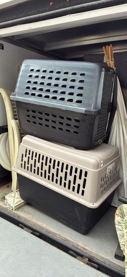 Two large/medium pet travel crates