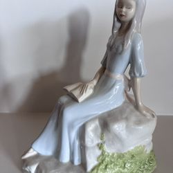 Resting Lady Porcelain Figurine