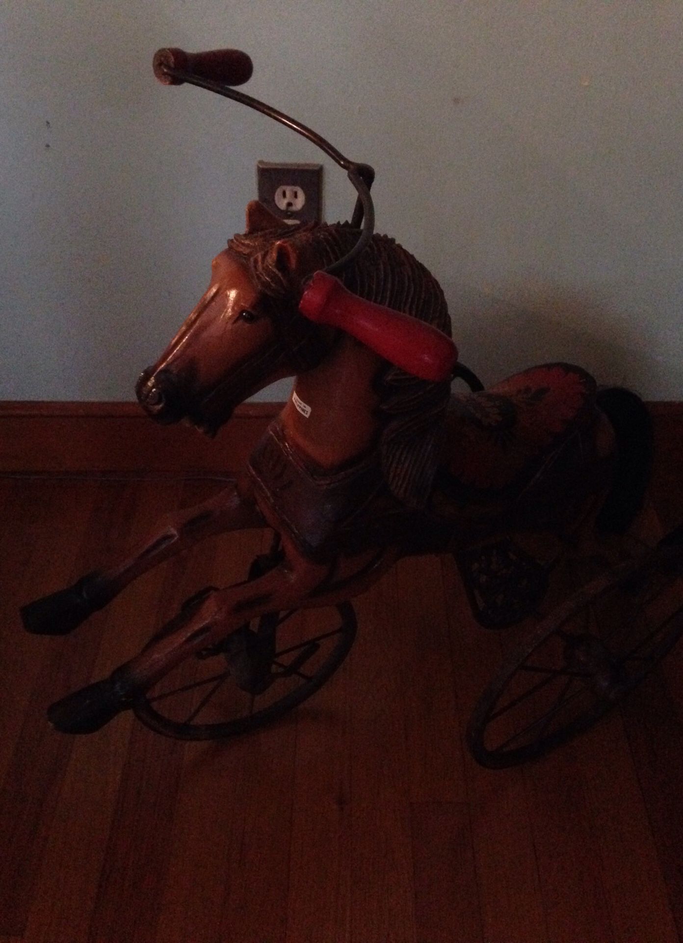 Antique tricycle horse looks nice in any living room