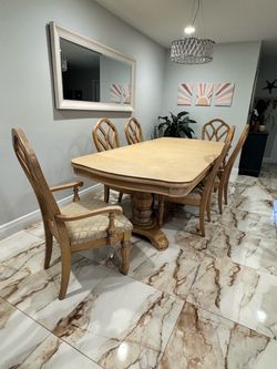 Used dining room table and six chairs with table pad. 300.00 OBO