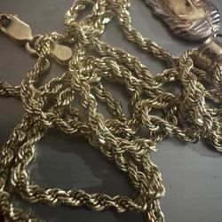 2 MM Rope Chain 10k 20 Inches Long New With Jesus Pendant