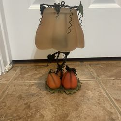 Pumpkin candle holder with glass shade