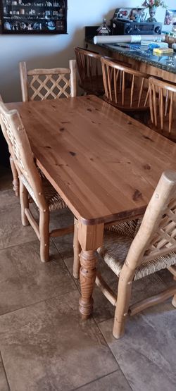 Solid Wood Table And 4 Chais $100
