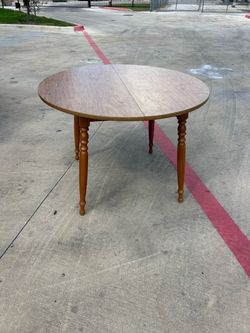 Round Wood Dining Table with Turned Legs