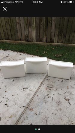 3 white wall hanging organizers