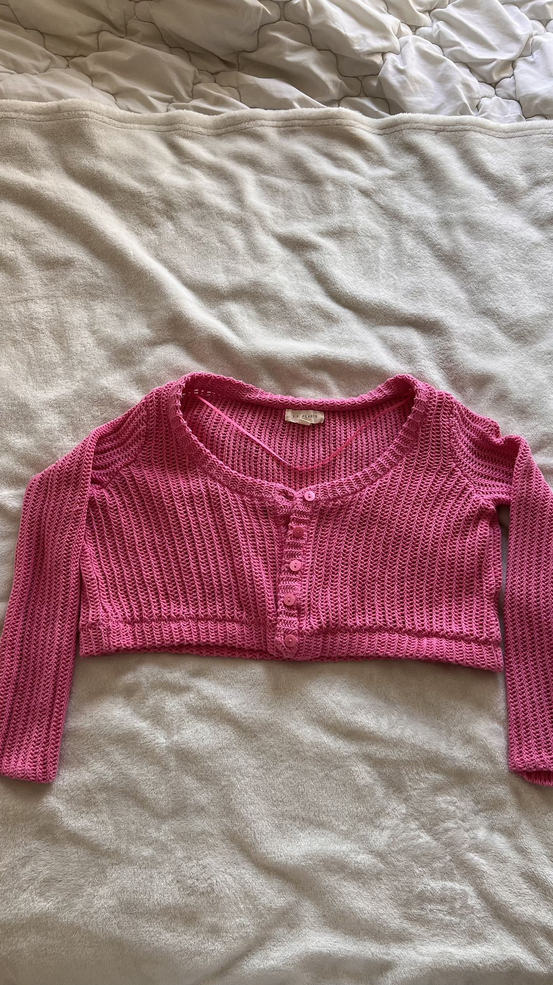 Cropped pink knitted sweater 