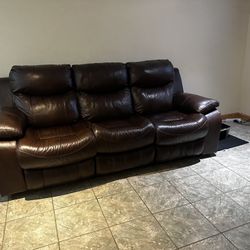 Leather reclining sofa 450 $