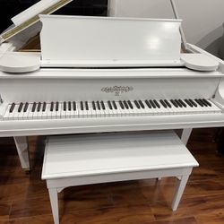 White Baby Grand Piano