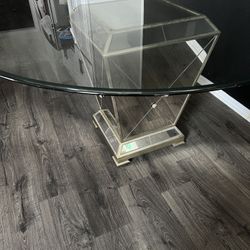Mirrored base round glass top dining table