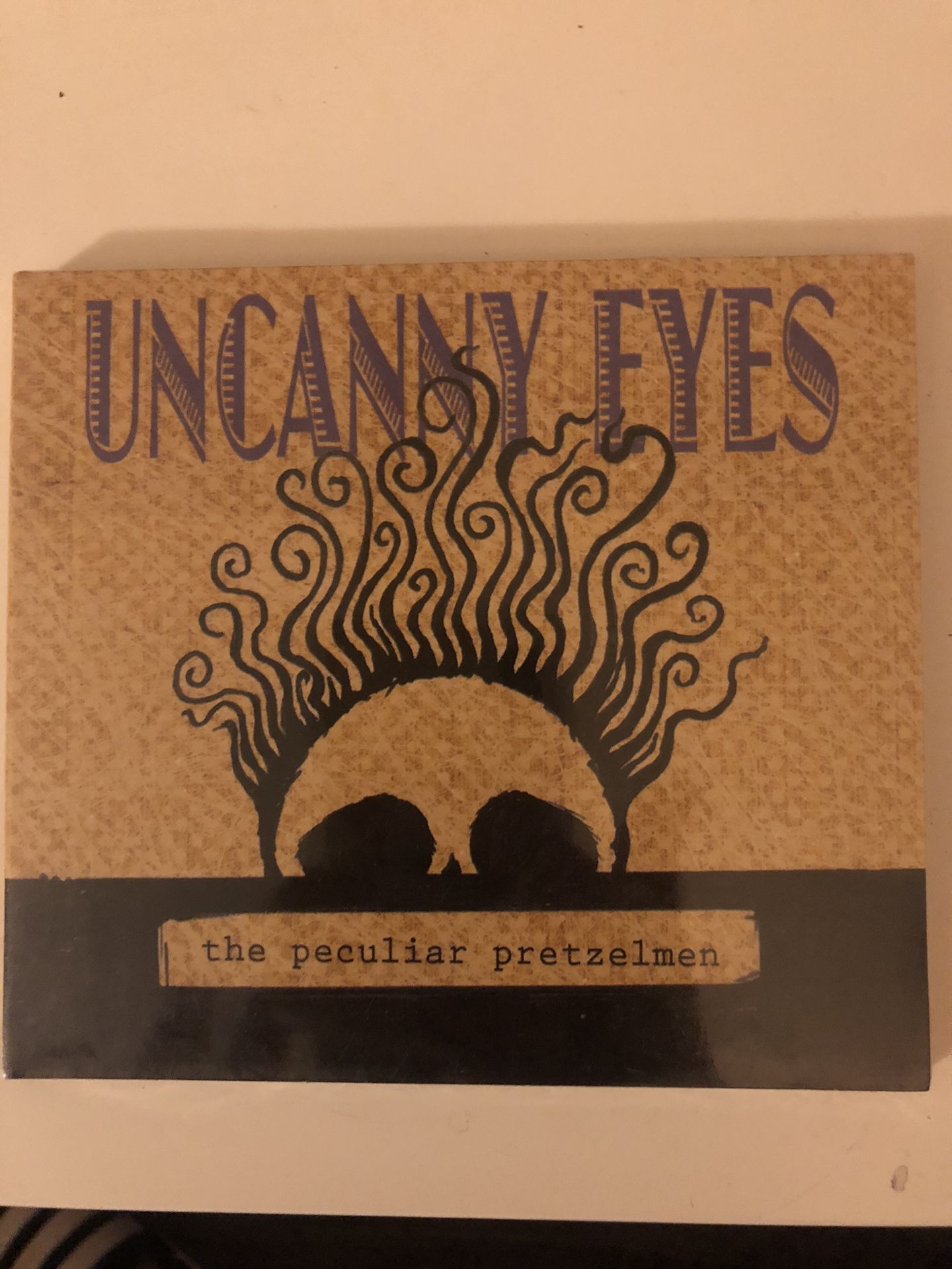 Uncanny Eyes by The Peculiar Pretzelmen